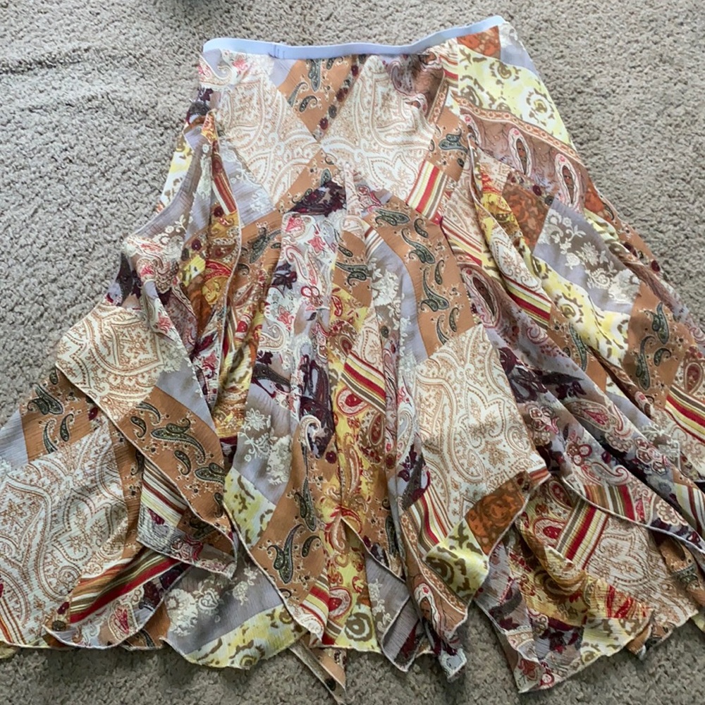 This is a Mid length multi colored skirt, S/M size.